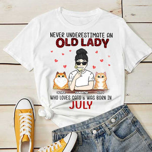 Never Underestimate An Old Lady Who Loves Cats - Personalized Unisex T-Shirt.