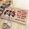 A Crazy Dog Lady And Her Grumpy Old Man Live Here - Personalized Decorative Mat