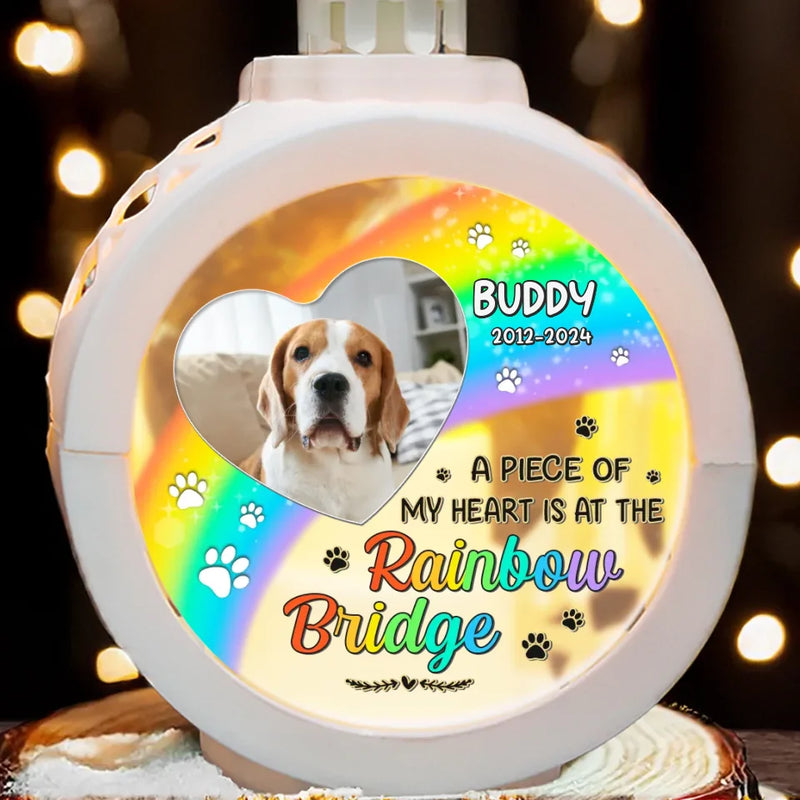 Custom Photo A Piece Of My Heart Is At The Rainbow Bridge - Memorial Personalized Custom Candlelight Lantern Ornament - Christmas Gift, Sympathy Gift For Pet Owners, Pet Lovers