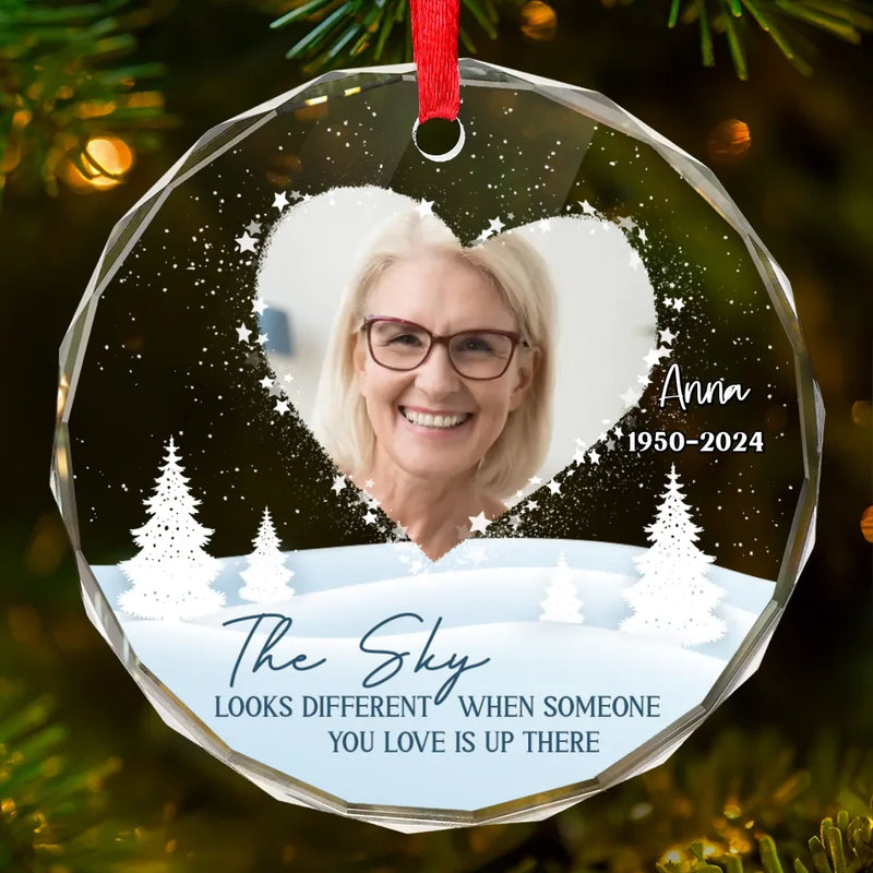 Custom Photo The Sky Looks Different When Someone You Love Is Up There - Memorial Personalized Custom Circle Glass Ornament - Sympathy Gift, Christmas Gift For Family Members
