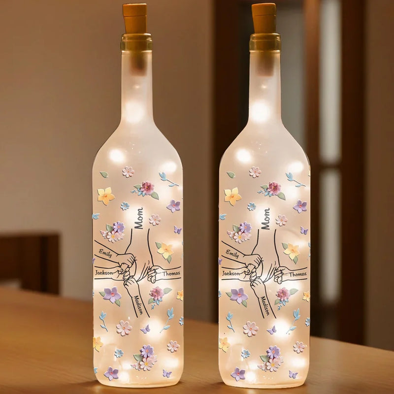 A Mother’s Hands Cradle The World While Filling It With Love - Family Personalized Custom Bottle Lamp - Gift For Mom, Grandma