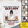 Never Underestimate An Old Lady Who Loves Dogs - Personalized Unisex T-Shirt