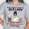 Never Underestimate An Old Lady Who Loves Dogs - Personalized Unisex T-Shirt